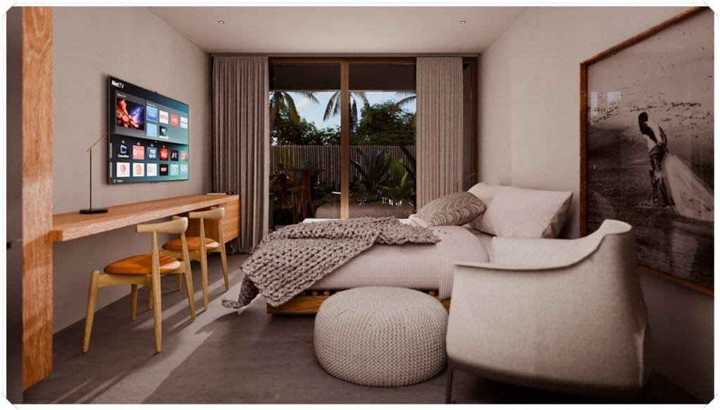 Quarto moderno com cama, mesa de trabalho, poltrona e TV em um ambiente claro, com vista para a área externa com plantas.