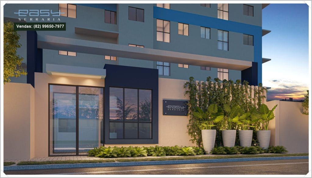 Fachada moderna do edifício Easy Serraria, destacando plantas ornamentais e iluminação suave ao entardecer.