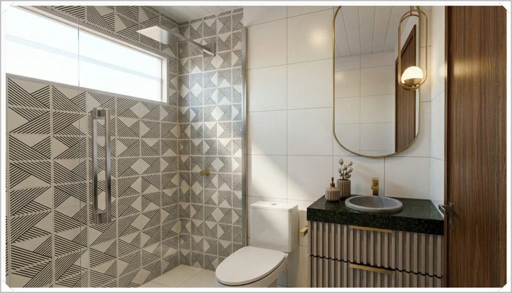 Banheiro moderno com piso e revestimento em azulejos geométricos em tons de cinza, pia com bancada em granito e iluminação suave.
