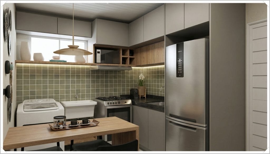Cozinha moderna com armários cinza e madeira, eletrodomésticos prateados, mesa de jantar e detalhes em verde nas paredes.