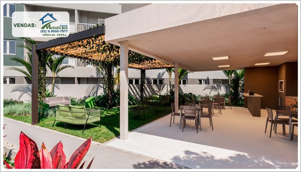 Espaço externo com churrasqueira dupla, mesas e cadeiras, cercado por plantas e decoração moderna em tons verdes e neutros.