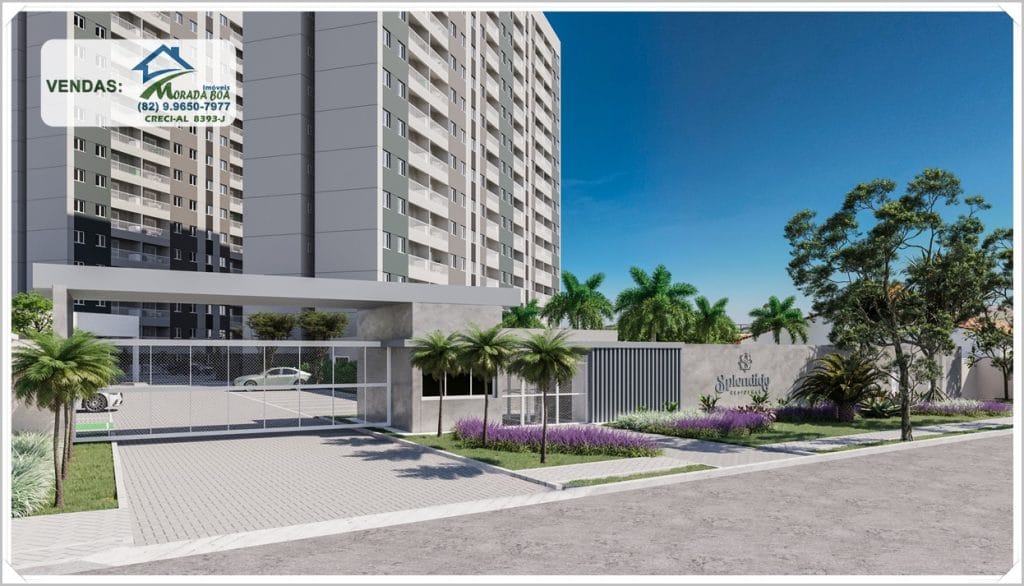 Entrada do Splendido Residence, com portaria moderna, plantas ornamentais e prédios altos ao fundo, sob um céu azul.